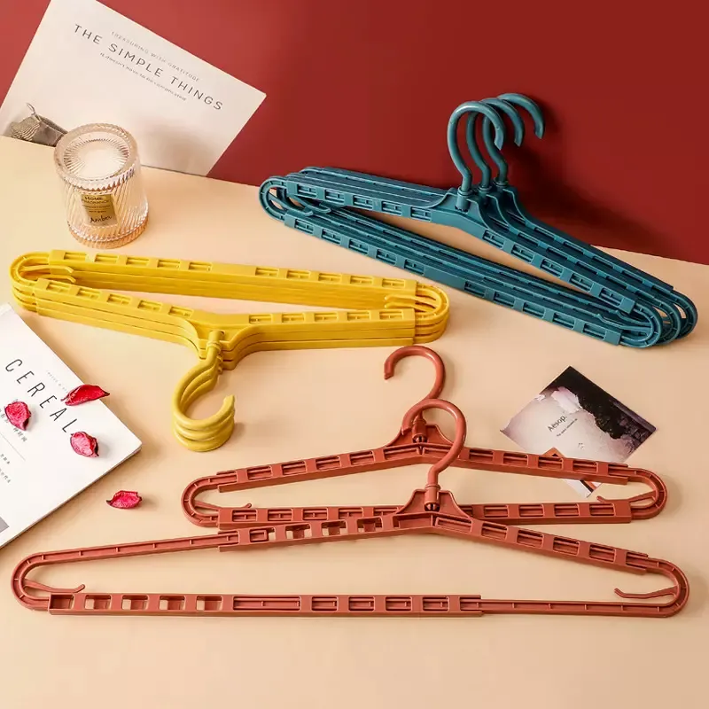 360 Degree Shrinkable Hangers for Clothes Swivel Hook Strong and Durable Clothes Hangers for Sheet Coats Pants (Random Color)